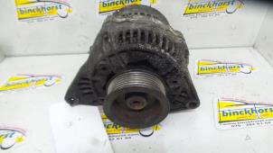 Gebruikte Dynamo Nissan Primera (P10) 2.0i 16V SPi Kat. Prijs € 42,00 Margeregeling aangeboden door Binckhorst BV