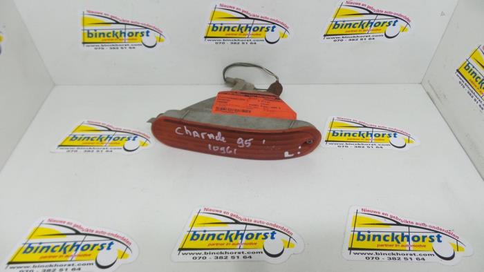Richtingaanwijzer links van een Daihatsu Charade (G200/201/202/203/204) 1.3i TX/CX 16V 1995