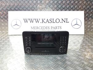 Gebruikte Radiobedienings paneel Mercedes ML II (164/4JG) 3.5 350 4-Matic V6 24V Prijs € 150,00 Margeregeling aangeboden door kaslo auto parts