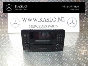 Gebruikte Radiobedienings paneel Mercedes ML II (164/4JG) 3.5 350 4-Matic V6 24V Prijs € 150,00 Margeregeling aangeboden door kaslo auto parts