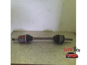 Gebruikte Aandrijfas links-voor Opel Astra K Sports Tourer 1.2 Turbo 12V Prijs op aanvraag aangeboden door Rooie Ben autodemontage