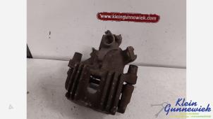 Gebruikte Remklauw (Tang) links-achter BMW Mini One Prijs € 40,00 Margeregeling aangeboden door Klein Gunnewiek Autodemontage & Motorentechniek