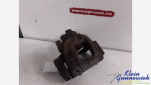 Gebruikte Remklauw (Tang) rechts-voor BMW Mini One Prijs € 40,00 Margeregeling aangeboden door Klein Gunnewiek Autodemontage & Motorentechniek