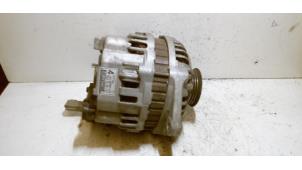 Gebruikte Dynamo Mazda 323 Fastbreak (BJ14) 2.0 16V Prijs € 40,00 Margeregeling aangeboden door Verhoef Cars & Parts