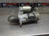 Startmotor van een Subaru Legacy Wagon (BR), Combi, 2009 / 2014 2010