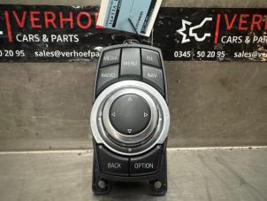 Gebruikte Regelunit Multi Media BMW 1 serie (F20) 116d 1.5 12V TwinPower Prijs € 150,00 Margeregeling aangeboden door Verhoef Cars & Parts