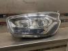 Koplamp links van een Ford Transit Custom 2.0 TDCi 16V Eco Blue 105 2020