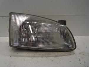 Gebruikte Koplamp rechts Toyota Starlet (EP9) 1.3,XLi,GLi 16V Prijs € 25,00 Margeregeling aangeboden door Verhoef Cars & Parts