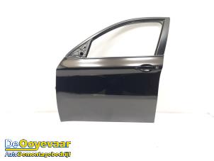 Gebruikte Portier 4Deurs links-voor BMW X6 (E71/72) xDrive35i 3.0 24V Prijs € 249,99 Margeregeling aangeboden door Autodemontagebedrijf De Ooyevaar