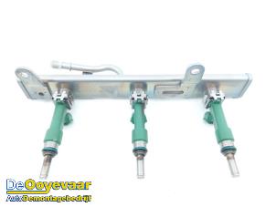 Gebruikte Injector brug Nissan Micra (K14) 1.0 IG-T 92 Prijs € 49,99 Margeregeling aangeboden door Autodemontagebedrijf De Ooyevaar