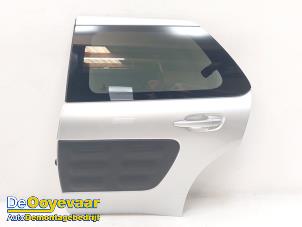 Gebruikte Deur 4Deurs links-achter Citroen C4 Cactus (0B/0P) 1.2 PureTech 82 12V Prijs € 149,99 Margeregeling aangeboden door Autodemontagebedrijf De Ooyevaar