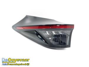 Gebruikte Achterlicht links Toyota Yaris Cross (PB1/PJ1) 1.5 12V Hybrid 130 Prijs € 275,00 Margeregeling aangeboden door Autodemontagebedrijf De Ooyevaar