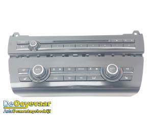 Gebruikte Kachel Bedieningspaneel BMW 5 serie Touring (F11) 520d 16V Prijs € 149,99 Margeregeling aangeboden door Autodemontagebedrijf De Ooyevaar