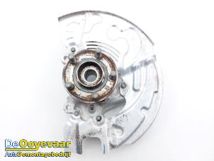 Gebruikte Fusee links-voor Ford Mustang Mach-E Prijs € 275,00 Margeregeling aangeboden door Autodemontagebedrijf De Ooyevaar