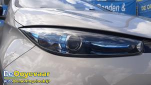 Gebruikte Koplamp rechts Renault Zoé (AG) 46kW Prijs € 299,99 Margeregeling aangeboden door Autodemontagebedrijf De Ooyevaar