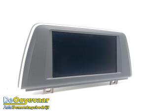 Gebruikte Display Multi Media regelunit BMW 2 serie Active Tourer (F45) 216i 1.5 TwinPower Turbo 12V Prijs € 149,99 Margeregeling aangeboden door Autodemontagebedrijf De Ooyevaar