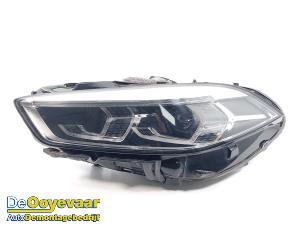 Gebruikte Koplamp links BMW 1 serie (F40) 118i 1.5 TwinPower 12V Prijs € 849,99 Margeregeling aangeboden door Autodemontagebedrijf De Ooyevaar