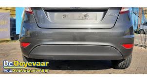 Gebruikte Achterbumper Ford Fiesta 6 (JA8) 1.25 16V Prijs € 125,00 Margeregeling aangeboden door Autodemontagebedrijf De Ooyevaar