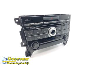 Gebruikte Radio CD Speler Mazda CX-7 2.3 MZR DISI Turbo 16V Prijs € 59,99 Margeregeling aangeboden door Autodemontagebedrijf De Ooyevaar