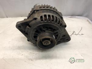 Gebruikte Alternator Kia Sephia (FA/FB22) 1.5i 16V Prijs € 30,00 Margeregeling aangeboden door Autobedrijf de Heer B.V.