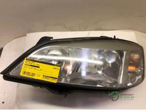 Gebruikte Koplamp links Opel Astra G Caravan (F35) 1.6 16V Prijs € 35,00 Margeregeling aangeboden door Autobedrijf de Heer B.V.