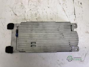 Bluetooth module van een MINI Mini (R56) 1.6 16V Cooper S 2011