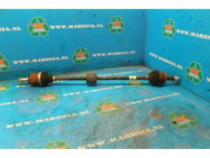 Gebruikte Aandrijfas rechts-voor Opel Corsa Prijs € 24,68 Margeregeling aangeboden door Maresia Auto Recycling B.V.