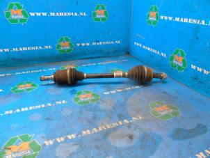 Gebruikte Aandrijfas links-voor Opel Corsa Prijs € 26,25 Margeregeling aangeboden door Maresia Auto Recycling B.V.