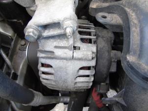 Gebruikte Alternator Ford Fiesta 6 (JA8) 1.25 16V Prijs € 21,00 Margeregeling aangeboden door Maresia Auto Recycling B.V.