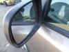 Buitenspiegel links van een Nissan Note (E11) 1.4 16V 2012