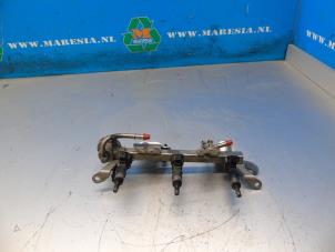 Gebruikte Injector brug Renault Captur (2R) 0.9 Energy TCE 12V Prijs € 36,75 Margeregeling aangeboden door Maresia Auto Recycling B.V.