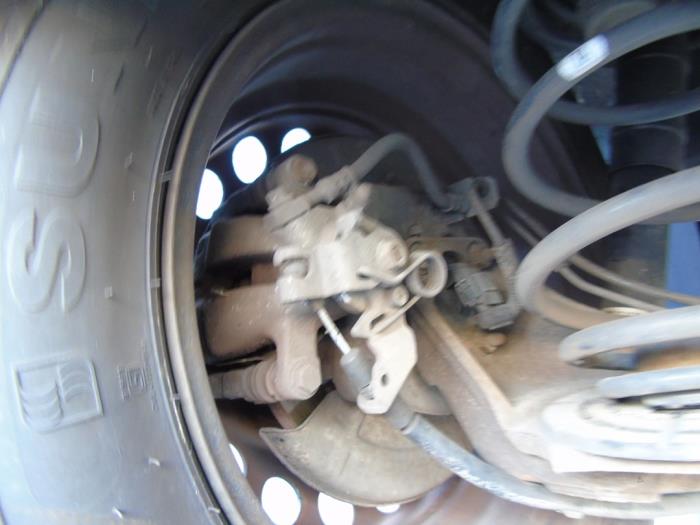 Rear brake calliper, left Opel Meriva