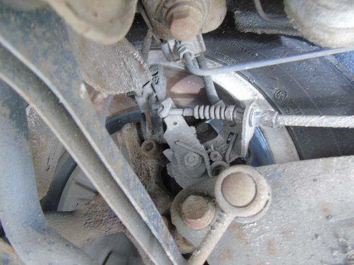 Rear brake calliper, left Volkswagen Golf Plus