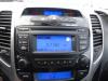 Radio CD Speler van een Hyundai iX20 (JC), 2010 / 2019 1.4 CRDi 16V, SUV, Diesel, 1.396cc, 66kW (90pk), FWD, D4FC, 2010-11 / 2019-07, JCF5D1; JCF5D2; JCF5DA; JCF5DB 2011