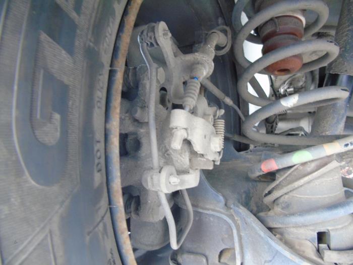 Rear brake calliper, left Peugeot Partner