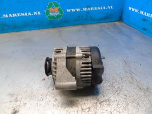 Gebruikte Dynamo Chevrolet Aveo (250) 1.2 16V Prijs € 15,75 Margeregeling aangeboden door Maresia Auto Recycling B.V.