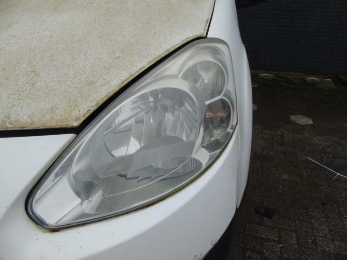 Headlight, left Peugeot Partner