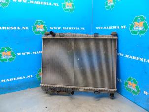 Gebruikte Radiateur Ford Fiesta 6 (JA8) 1.25 16V Prijs € 68,25 Margeregeling aangeboden door Maresia Auto Recycling B.V.