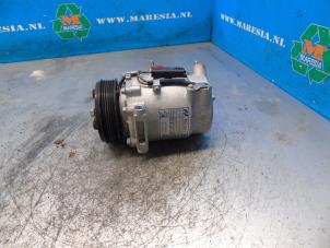 Gebruikte Aircopomp Opel Corsa F (UB/UH/UP) 1.2 12V 75 Prijs € 194,25 Margeregeling aangeboden door Maresia Auto Recycling B.V.