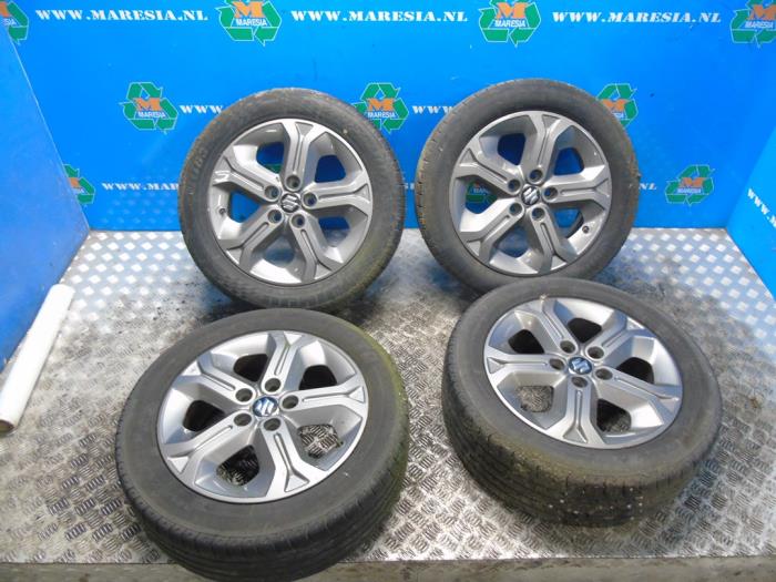 Velgen set + banden van een Suzuki Vitara (LY/MY) 1.6 16V VVT 2015
