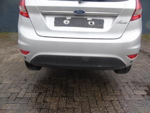 Gebruikte Bumper achter Ford Fiesta 6 (JA8) 1.25 16V Prijs € 131,25 Margeregeling aangeboden door Maresia Auto Recycling B.V.