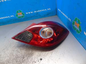 Gebruikte Achterlicht rechts Opel Corsa D 1.2 16V Prijs € 42,00 Margeregeling aangeboden door Maresia Auto Recycling B.V.