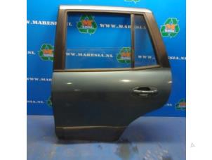 Gebruikte Deur 4Deurs links-achter Hyundai Santa Fe I 2.4 16V 4x4 Prijs € 131,25 Margeregeling aangeboden door Maresia Auto Recycling B.V.