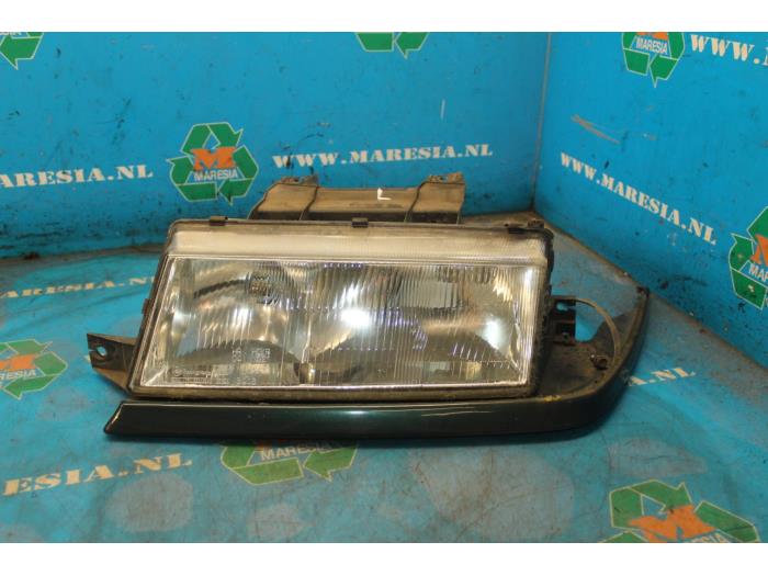 Headlight, left Ssang Yong Musso