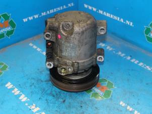 Gebruikte Aircopomp Nissan Primera (P11) 2.0 SRi 16V Prijs € 47,25 Margeregeling aangeboden door Maresia Auto Recycling B.V.