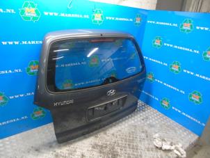 Gebruikte Achterklep Hyundai Trajet 2.0 CVVT 16V Prijs € 157,50 Margeregeling aangeboden door Maresia Auto Recycling B.V.