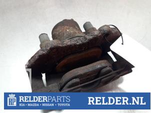 Gebruikte Remklauw (Tang) rechts-voor Mazda 3 (BL12/BLA2/BLB2) 2.0i MZR DISI 16V Prijs € 45,00 Margeregeling aangeboden door Relder Parts B.V.