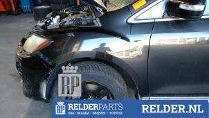 Gebruikte Spatbord links-voor Mazda CX-7 2.2 MZR-CD 16V Prijs € 68,00 Margeregeling aangeboden door Relder Parts B.V.