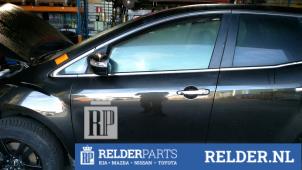 Gebruikte Deur 4Deurs links-voor Mazda CX-7 2.2 MZR-CD 16V Prijs € 270,00 Margeregeling aangeboden door Relder Parts B.V.