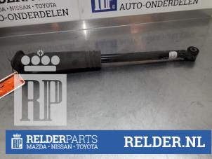 Gebruikte Schokdemper links-achter Nissan Micra (K14) 1.0 IG-T 100 Prijs € 30,00 Margeregeling aangeboden door Relder Parts B.V.